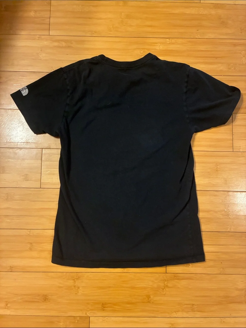The North Face Black Tee with White Circular Logo